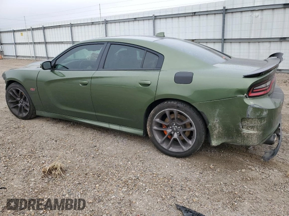 2021 Dodge Charger Scat Pack with VIN 2C3CDXGJ7MH503684, listed as a Copart auction lot 42331415 with 82,114 mi miles and Salvage Title. Bid and sale history available at DreamBid. Image 2.