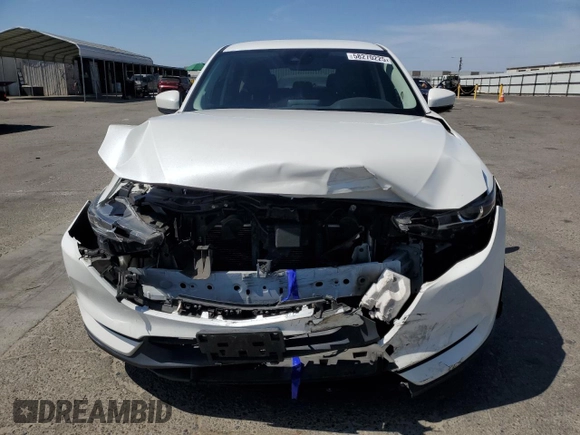 2020 Mazda CX-5 Touring z VIN JM3KFACM7L0833480, wystawiony jako Copart lot #58270225 z przebiegiem 46 061 mil mil oraz Szkoda całkowita • Salvage title. Historia ofert i sprzedaży dostępna na DreamBid. Obrazek 5.