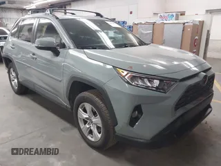 2019 Toyota RAV4 XLE with VIN JTMP1RFV2KD028137, listed as a IAAI auction lot 41931454 with 88,998 mi miles and . Bid and sale history available at DreamBid. Image 1.