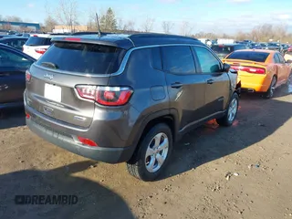 2020 Jeep Compass Latitude with VIN 3C4NJDBB3LT223939, listed as a IAAI auction lot 41832921 with 83,938 mi miles and . Bid and sale history available at DreamBid. Image 4.
