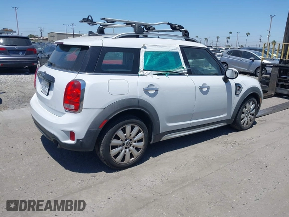 2019 MINI Countryman Cooper S with VIN WMZYT3C59K3J32727, listed as a IAAI auction lot 42328441 with Not provided miles and . Bid and sale history available at DreamBid. Image 4.