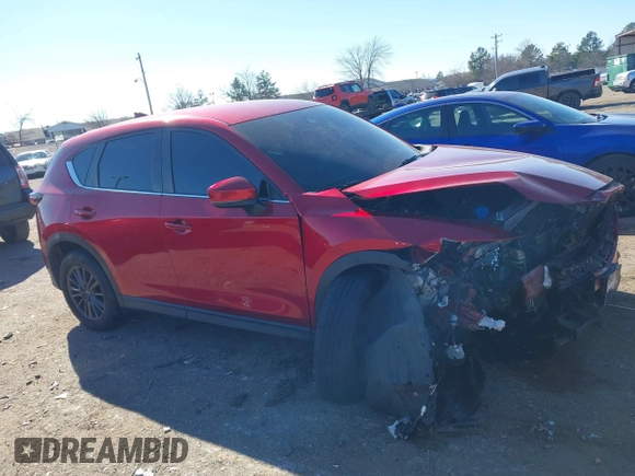 2019 Mazda CX-5 Sport with VIN JM3KFBBM2K0508743, listed as a IAAI auction lot 41288659 with 77,710 mi miles and . Bid and sale history available at DreamBid. Image 13.
