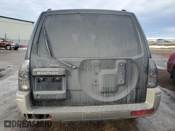 2003 Mitsubishi Montero z VIN JA4NW31SX3J600944, wystawiony jako Copart lot #87611305 z przebiegiem 215 693 mil mil oraz Czysty tytuł • Clean title. Historia ofert i sprzedaży dostępna na DreamBid. Obrazek 6.