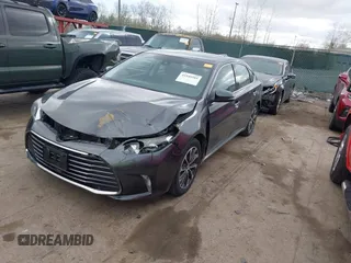2018 Toyota Avalon XLE with VIN 4T1BK1EB9JU275097, listed as a IAAI auction lot 41940585 with 119,854 mi miles and . Bid and sale history available at DreamBid. Image 2.
