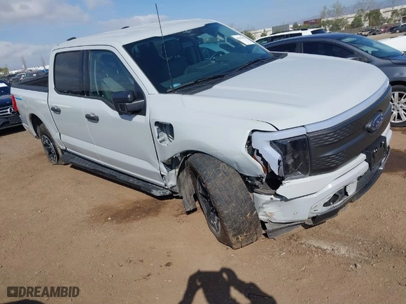 2023 Ford F-150 Lightning Pro with VIN 1FTVW1EL6PWG01336, listed as a IAAI auction lot 41692903 with 39,085 mi miles. Bid and sale history available at carsss.com. Image 1.