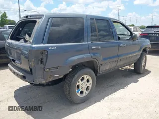 2001 Jeep Grand Cherokee Laredo с VIN 1J4GW48S21C724583, выставлен на аукционе IAAI как лот 42586354 с пробегом Не указан миль и . История ставок и продаж доступна на DreamBid. Изображение 4.