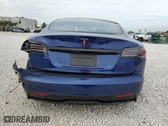 2023 Tesla Model S with VIN 5YJSA1E58PF498685, listed as a Copart auction lot 41690475 with Not provided miles and Salvage title. Bid and sale history available at DreamBid. Image 6.