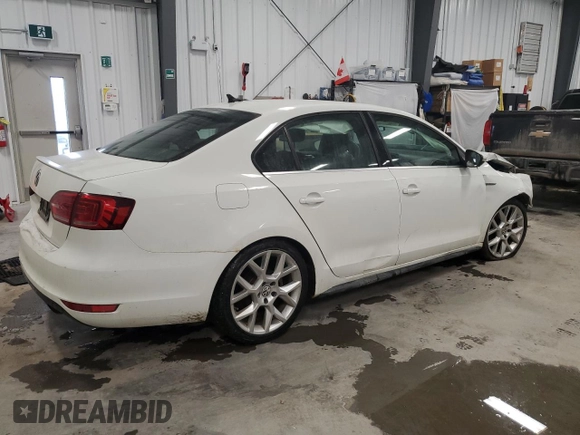 2014 Volkswagen Jetta GLI Edition 30 z VIN 3VW4S7AJ9EM277971, wystawiony jako Copart lot #88305645 z przebiegiem 167 931 mil mil oraz Szkoda całkowita • Salvage title. Historia ofert i sprzedaży dostępna na DreamBid. Obrazek 3.