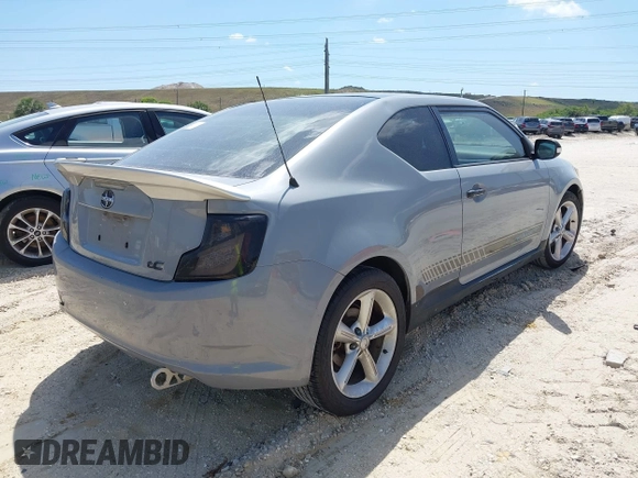 2012 Scion tC with VIN JTKJF5C79C3043661, listed as a IAAI auction lot 42020903 with 184,891 mi miles. Bid and sale history available at carsss.com. Image 4.