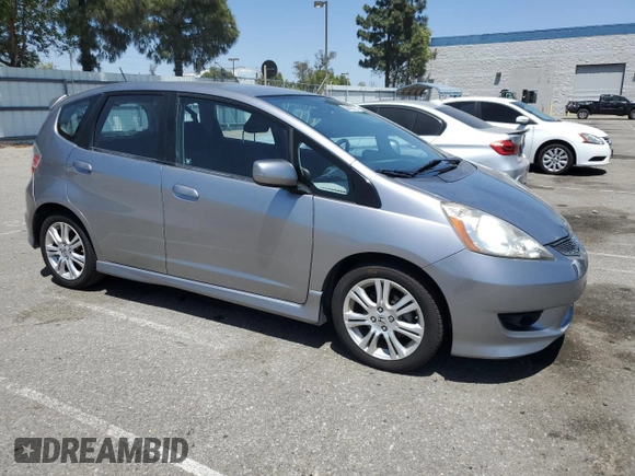 2010 Honda Fit Sport with VIN JHMGE8H69AS025801, listed as a Copart auction lot 58416375 with 216,216 mi miles and Clean title. Bid and sale history available at DreamBid. Image 4.
