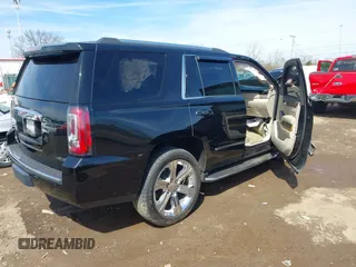 2017 GMC Yukon Denali with VIN 1GKS2CKJ0HR185365, listed as a IAAI auction lot 41856187 with 107,641 mi miles. Bid and sale history available at carsss.com. Image 4.