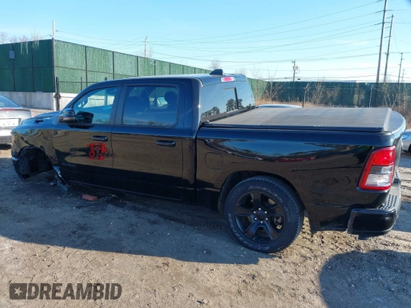 2023 Ram 1500 Big Horn with VIN 1C6SRFFT1PN660751, listed as a IAAI auction lot 41692496 with 30,215 mi miles and . Bid and sale history available at DreamBid. Image 3.