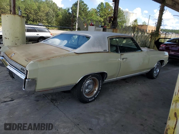 1972 Chevrolet Monte Carlo z VIN 1H57J2L567411, wystawiony jako Copart lot #72465014 z przebiegiem 83 239 mil mil oraz Szkody całkowita. Historia ofert i sprzedaży dostępna na DreamBid. Obrazek 3.