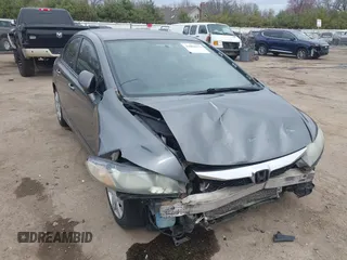 2011 Honda Civic LX with VIN 19XFA1F54BE032699, listed as a IAAI auction lot 42060272 with 197,905 mi miles and . Bid and sale history available at DreamBid. Image 1.