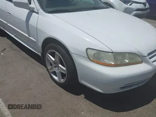 2002 Honda Accord EX z VIN 1HGCG16542A053039, wystawiony jako IAAI lot #42308687 z przebiegiem 206 864 mil mil oraz . Historia ofert i sprzedaży dostępna na DreamBid. Obrazek 6.