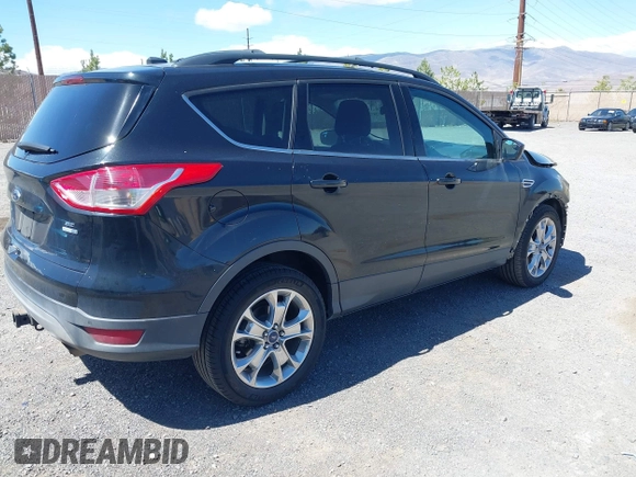 2014 Ford Escape SE z VIN 1FMCU9G97EUB64559, wystawiony jako IAAI lot #42238726 z przebiegiem 124 633 mil mil oraz . Historia ofert i sprzedaży dostępna na DreamBid. Obrazek 4.