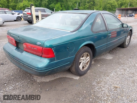 1996 Ford Thunderbird LX z VIN 1FALP62W9TH118637, wystawiony jako IAAI lot #42311641 z przebiegiem 96 361 mil mil oraz . Historia ofert i sprzedaży dostępna na DreamBid. Obrazek 4.