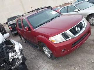 2008 Nissan Pathfinder S with VIN 5N1AR18U28C634844, listed as a IAAI auction lot 41209390 with 203,949 mi miles. Bid and sale history available at carsss.com. Image 1.