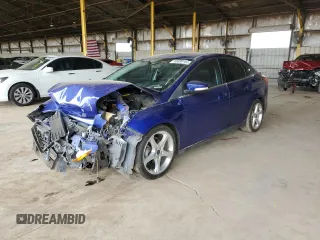 2014 Ford Focus Titanium with VIN 1FADP3J21EL357617, listed as a Copart auction lot 50660165 with 120,211 mi miles and Salvage Title. Bid and sale history available at carsss.com. Image 1.