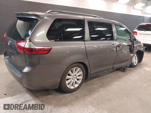 2015 Toyota Sienna XLE with VIN 5TDYK3DC3FS677780, listed as a IAAI auction lot 42155459 with 102,355 mi miles. Bid and sale history available at carsss.com. Image 4.