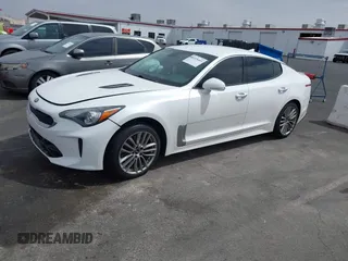 2018 Kia Stinger with VIN KNAE15LA8J6031125, listed as a IAAI auction lot 41928665 with 82,003 mi miles. Bid and sale history available at carsss.com. Image 2.
