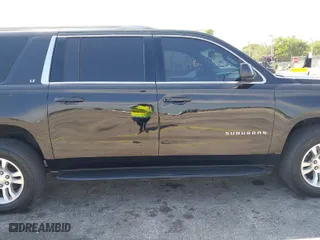 2018 Chevrolet Suburban LT with VIN 1GNSCHKC7JR111560, listed as a IAAI auction lot 41823175 with 136,751 mi miles. Bid and sale history available at carsss.com. Image 6.