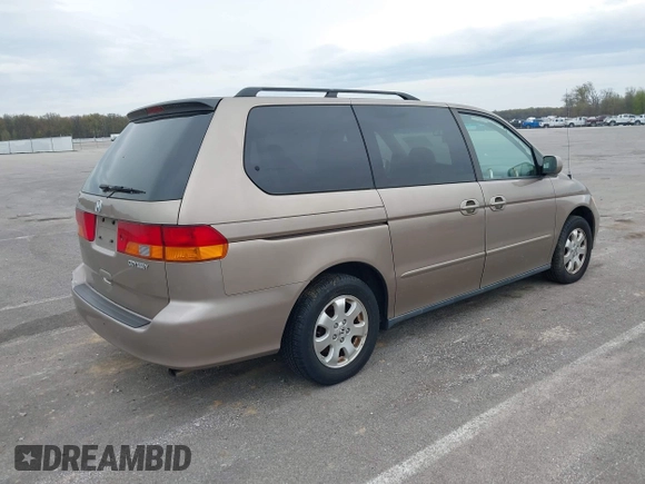 2004 Honda Odyssey EX-L with VIN 5FNRL18744B034830, listed as a IAAI auction lot 42052008 with 182,178 mi miles and . Bid and sale history available at DreamBid. Image 4.