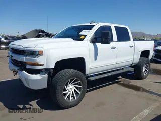 2016 Chevrolet Silverado 1500 LT with VIN 3GCUKREC5GG369915, listed as a IAAI auction lot 42082155 with 137,671 mi miles and . Bid and sale history available at DreamBid. Image 17.