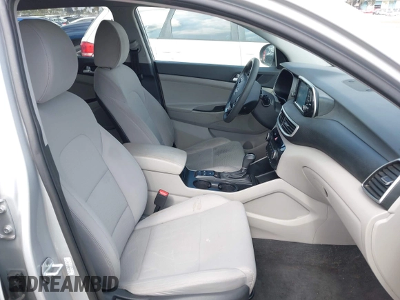 2019 Hyundai Tucson Value with VIN KM8J3CA46KU962082, listed as a IAAI auction lot 42160288 with 92,887 mi miles and . Bid and sale history available at DreamBid. Image 5.