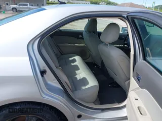 2010 Ford Fusion SE z VIN 3FAHP0HA6AR238485, wystawiony jako IAAI lot #42237682 z przebiegiem 147 260 mil mil oraz . Historia ofert i sprzedaży dostępna na DreamBid. Obrazek 8.