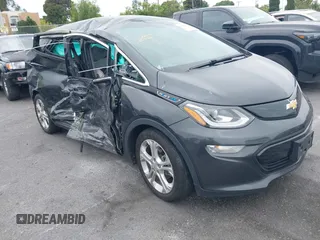 2018 Chevrolet Bolt EV LT z VIN 1G1FW6S02J4133385, wystawiony jako IAAI lot #42380348 z przebiegiem 87 041 mil mil oraz . Historia ofert i sprzedaży dostępna na DreamBid. Obrazek 1.