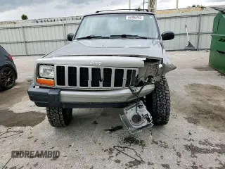 2001 Jeep Cherokee Sport with VIN 1J4FF48S91L592966, listed as a Copart auction lot 58996445 with 159,140 mi miles and Salvage title. Bid and sale history available at DreamBid. Image 14.