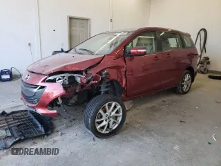 2015 Mazda 5 Touring with VIN JM1CW2CL7F0179885, listed as a Copart auction lot 82764993 with 31,306 mi miles and Salvage Title. Bid and sale history available at carsss.com. Image 1.