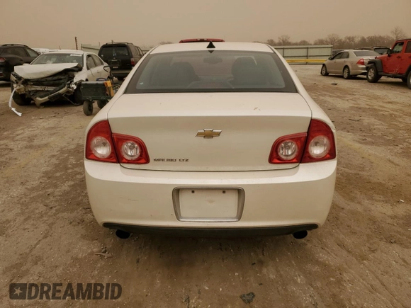 2012 Chevrolet Malibu LTZ with VIN 1G1ZG5E74CF315920, listed as a Copart auction lot 48864385 with 163,221 mi miles and Salvage Title. Bid and sale history available at DreamBid. Image 6.
