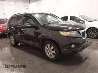 2013 Kia Sorento LX with VIN 5XYKTCA62DG338648, listed as a IAAI auction lot 42352573 with 164,486 mi miles and . Bid and sale history available at DreamBid. Image 1.