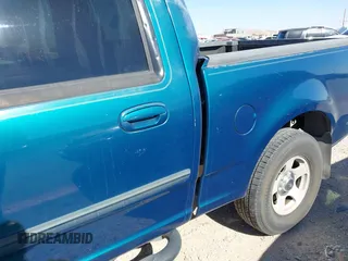 2001 Ford F-150 XLT with VIN 1FTRW07W01KA75819, listed as a IAAI auction lot 42293859 with 156,137 mi miles and . Bid and sale history available at DreamBid. Image 6.