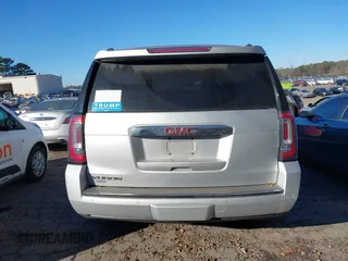 2018 GMC Yukon Denali with VIN 1GKS1CKJ9JR241330, listed as a IAAI auction lot 41180538 with 100,300 mi miles. Bid and sale history available at carsss.com. Image 16.