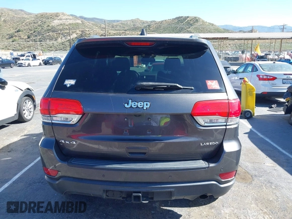 2016 Jeep Grand Cherokee Laredo z VIN 1C4RJFAG5GC390413, wystawiony jako IAAI lot #42254165 z przebiegiem 99 231 mil mil oraz . Historia ofert i sprzedaży dostępna na DreamBid. Obrazek 16.