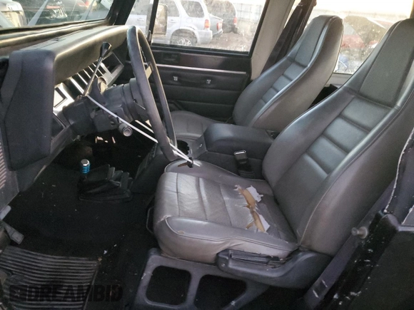 1994 Jeep Wrangler S with VIN 1J4FY19PXRP414104, listed as a Copart auction lot 79898264 with 166,963 mi miles and Clean Title. Bid and sale history available at carsss.com. Image 7.