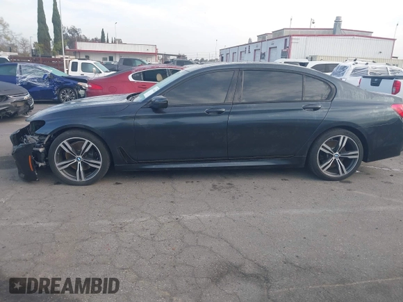 2016 BMW 7 Series 740i with VIN WBA7E2C51GG547537, listed as a IAAI auction lot 41794434 with 149,655 mi miles. Bid and sale history available at carsss.com. Image 15.