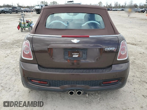 2011 MINI Convertible S with VIN WMWZP3C58BTX83725, listed as a Copart auction lot 44418965 with 45,401 mi miles and Salvage title. Bid and sale history available at DreamBid. Image 6.