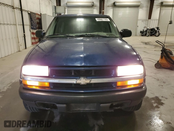 1999 Chevrolet Blazer LS с VIN 1GNCT18W9XK157387, выставлен на аукционе Copart как лот 49667765 с пробегом 182 411 миль миль и Списание • Salvage title. История ставок и продаж доступна на DreamBid. Изображение 5.