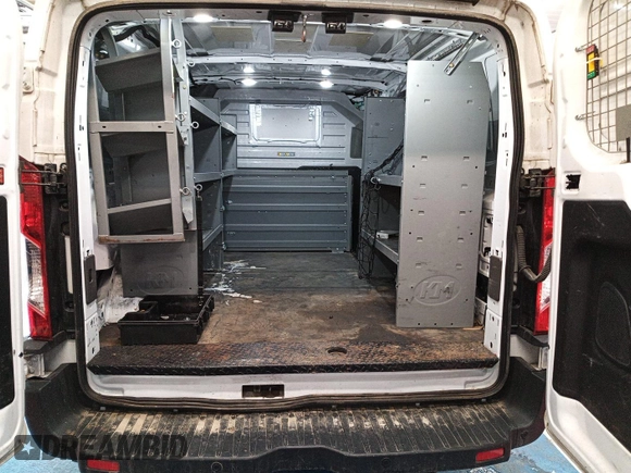 2021 Ford Transit Cargo with VIN 1FTBR2YG2MKA51800, listed as a IAAI auction lot 42793917 with 61,733 mi miles and . Bid and sale history available at DreamBid. Image 12.