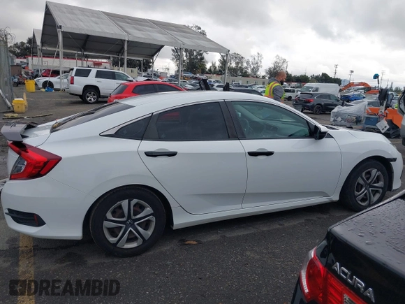 2016 Honda Civic Sedan LX with VIN 2HGFC2F54GH564676, listed as a IAAI auction lot 41784352 with 107,939 mi miles. Bid and sale history available at carsss.com. Image 14.
