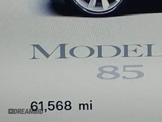 2013 Tesla Model S with VIN 5YJSA1CN0DFP20053, listed as a IAAI auction lot 41470660 with 61,568 mi miles and . Bid and sale history available at DreamBid. Image 16.