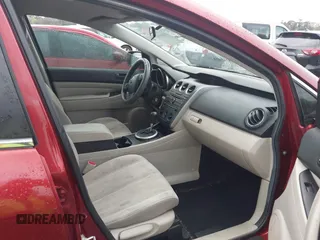 2011 Mazda CX-7 i SV with VIN JM3ER2A54B0359833, listed as a IAAI auction lot 41640336 with 140,302 mi miles. Bid and sale history available at carsss.com. Image 5.