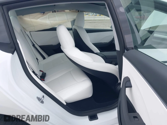 2025 Tesla Model 3 Long Range with VIN 5YJ3E1EA0SF932385, listed as a IAAI auction lot 41772613 with 1,683 mi miles and . Bid and sale history available at carsss.com. Image 8.
