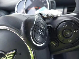 2021 MINI Hardtop 4 Door Oxford Edition with VIN WMWXU7C09M2P17351, listed as a IAAI auction lot 42330197 with 51,628 mi miles and . Bid and sale history available at DreamBid. Image 11.
