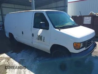 2003 Ford Econoline Cargo with VIN 1FTRE14W03HB60401, listed as a IAAI auction lot 41852847 with 325,883 mi miles. Bid and sale history available at carsss.com. Image 1.
