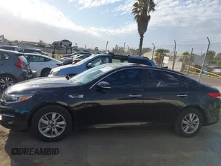 2018 Kia Optima LX with VIN KNAGT4L35J5238723, listed as a IAAI auction lot 41702109 with 66,620 mi miles. Bid and sale history available at carsss.com. Image 13.